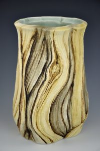 Pottery with textures inspired by the ancient bristlecone pine trees. Porcelain, underglazes, glazes