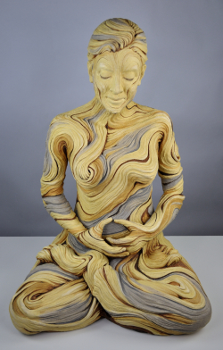 Life sized meditating figure with bristlecone pine inspired textures. White stoneware and underglazes.