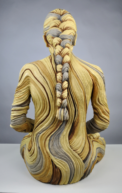 Life sized meditating figure with bristlecone pine inspired textures. White stoneware and underglazes.