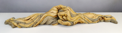 Large than life sized clasped hands with bristlecone pine inspired textures. White stoneware and underglazes.